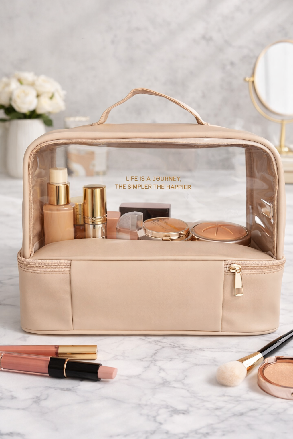 Beige cosmetic bag with makeup items on a marble surface