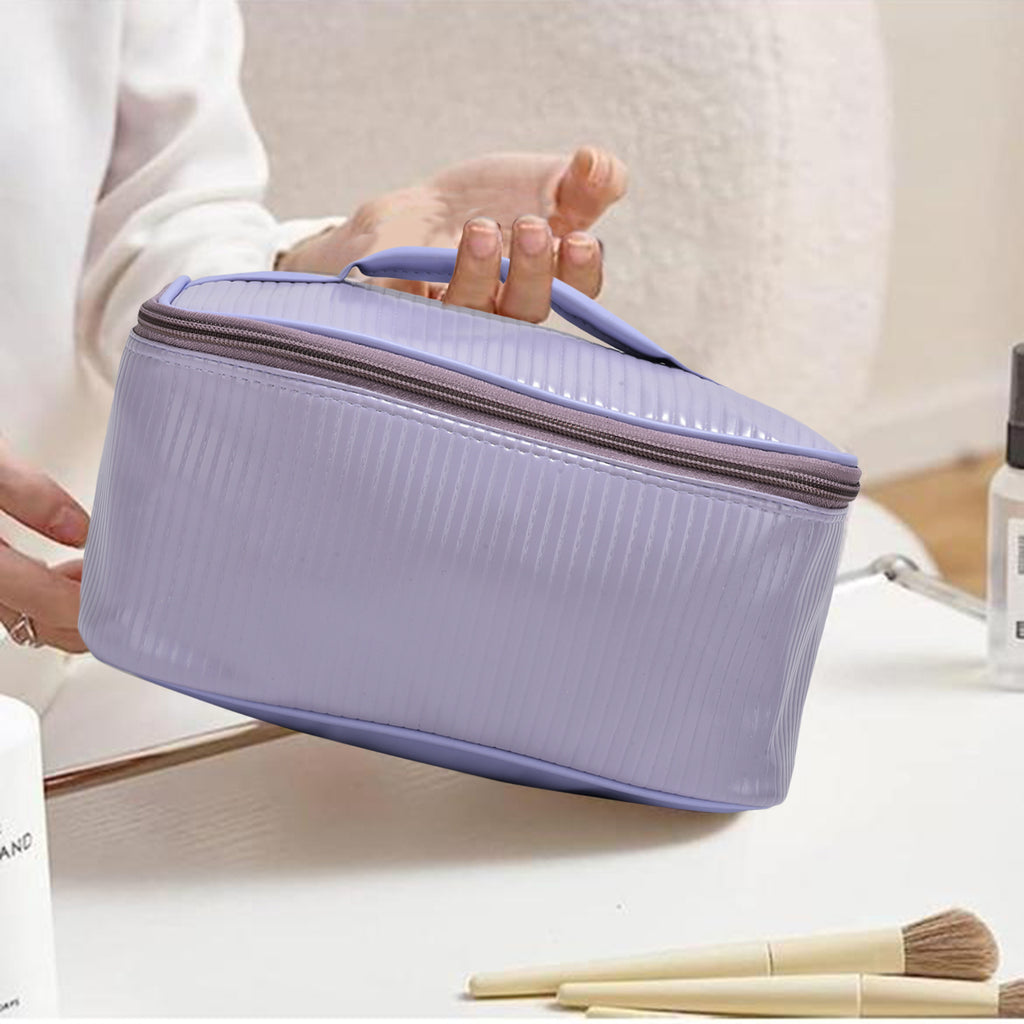 Lilac Bloom soft-touch pouch shown with makeup
